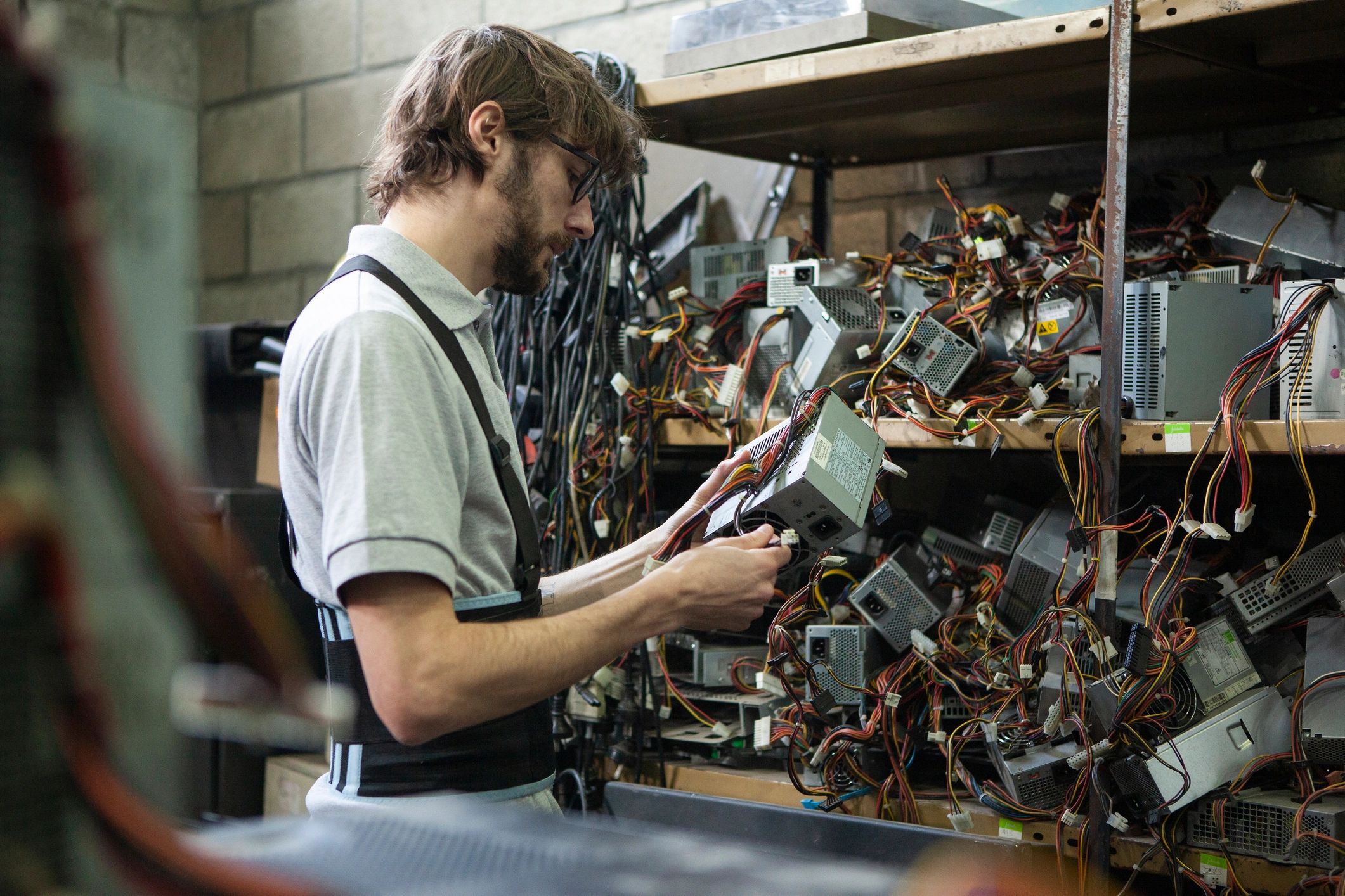 Technician inspecting equipment for power solution support