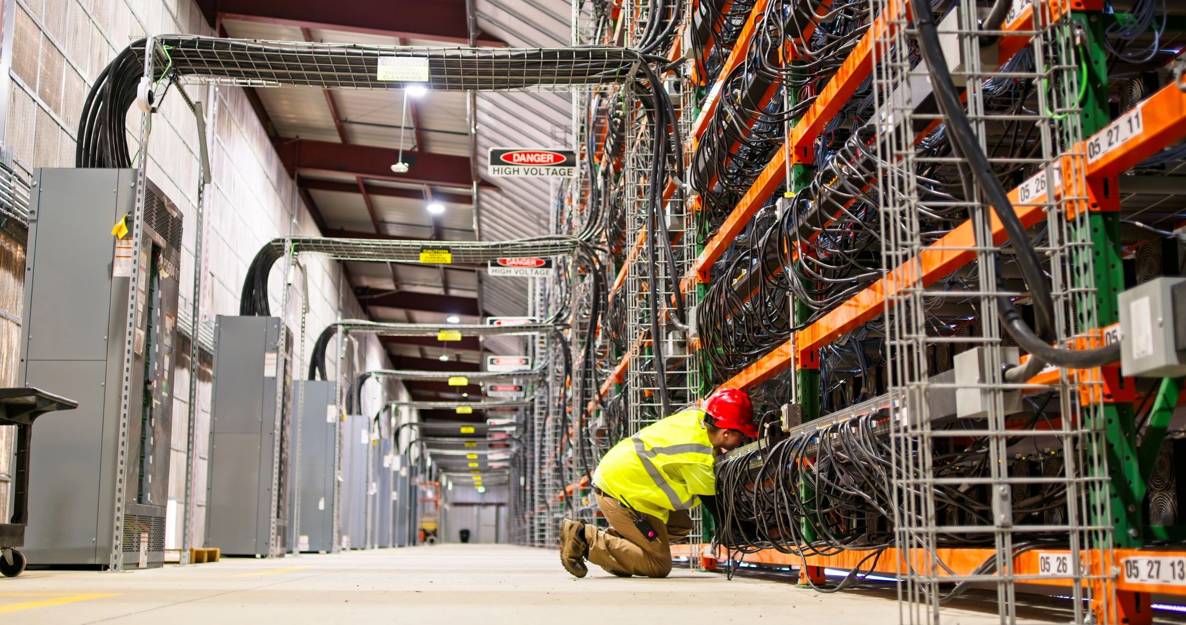 Technician working on equipment in a technical installation environment