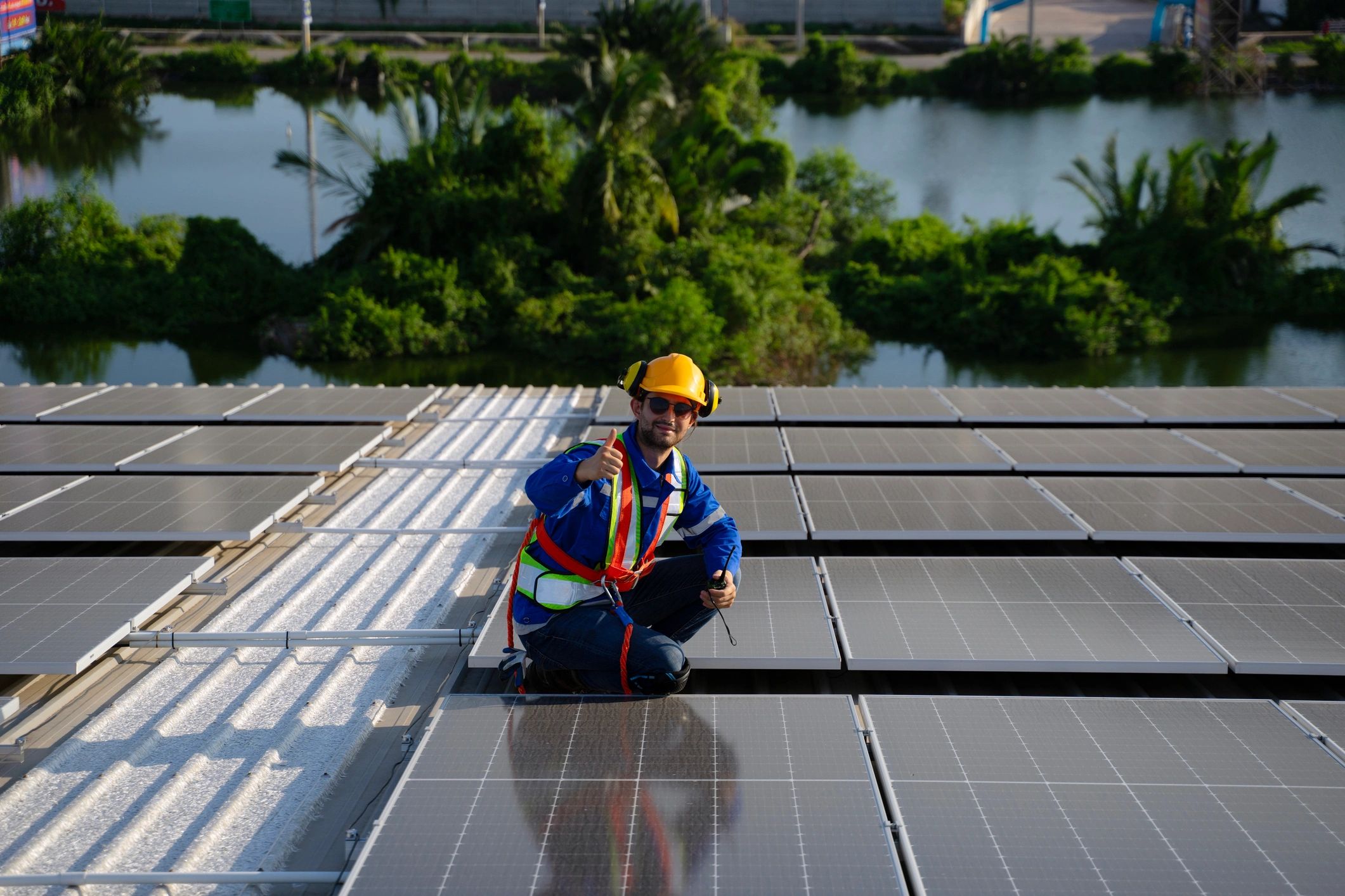 Solar installation team working on rooftop panels