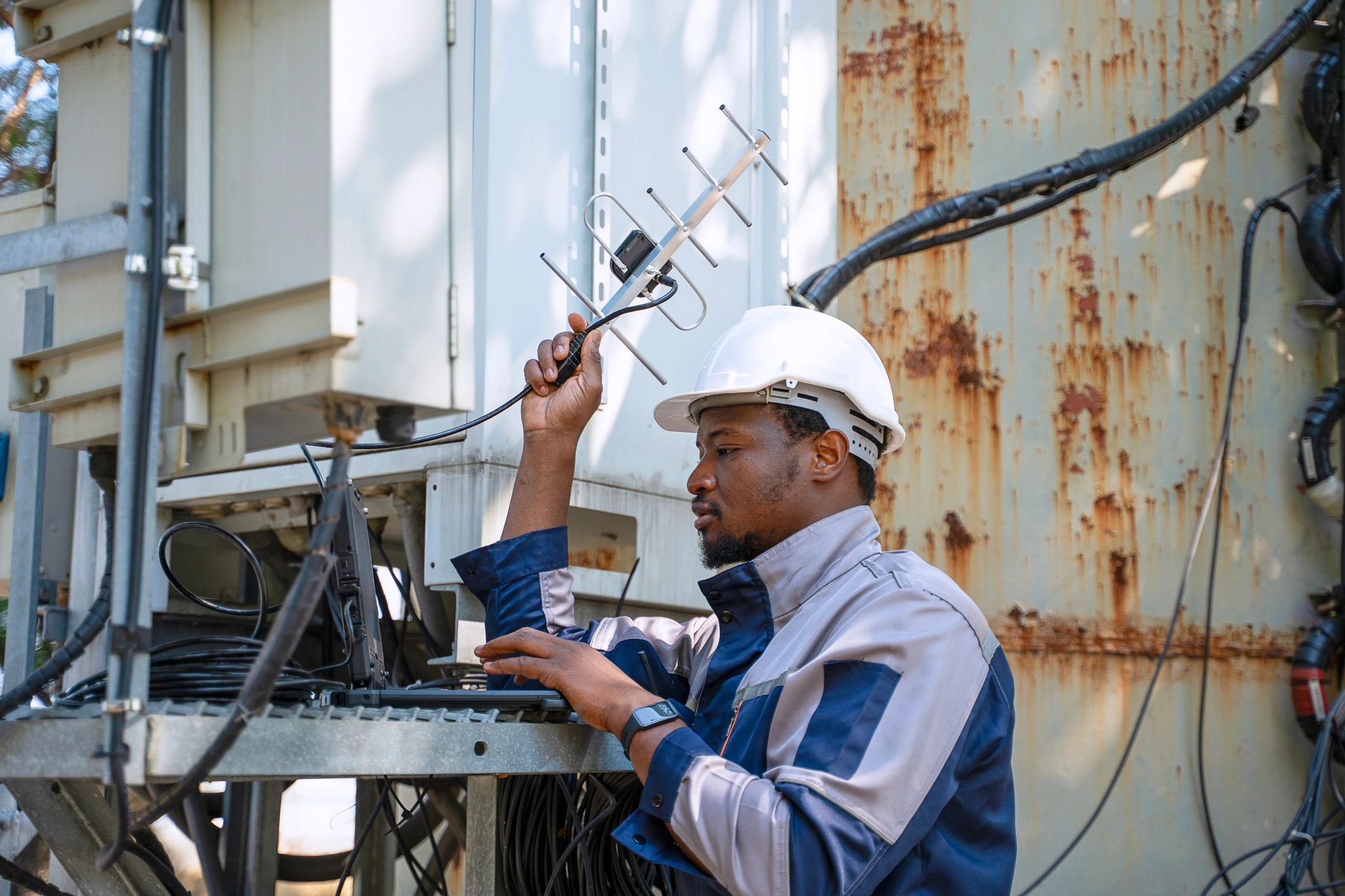Engineer inspecting power backup equipment